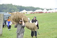 :::Submitted Articles:From Ercc Glaison:Photos of Ercc:Ercc carrying bales of straw.jpg